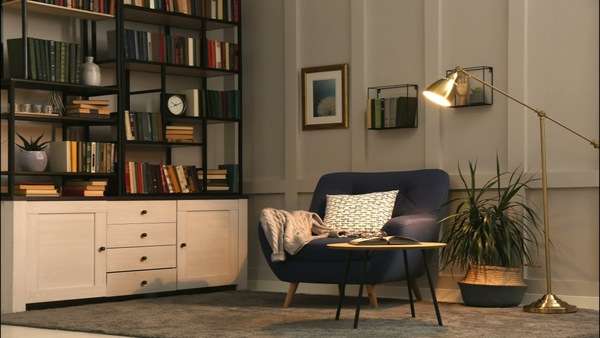 Open books on shelves in a calm reading space with warm light